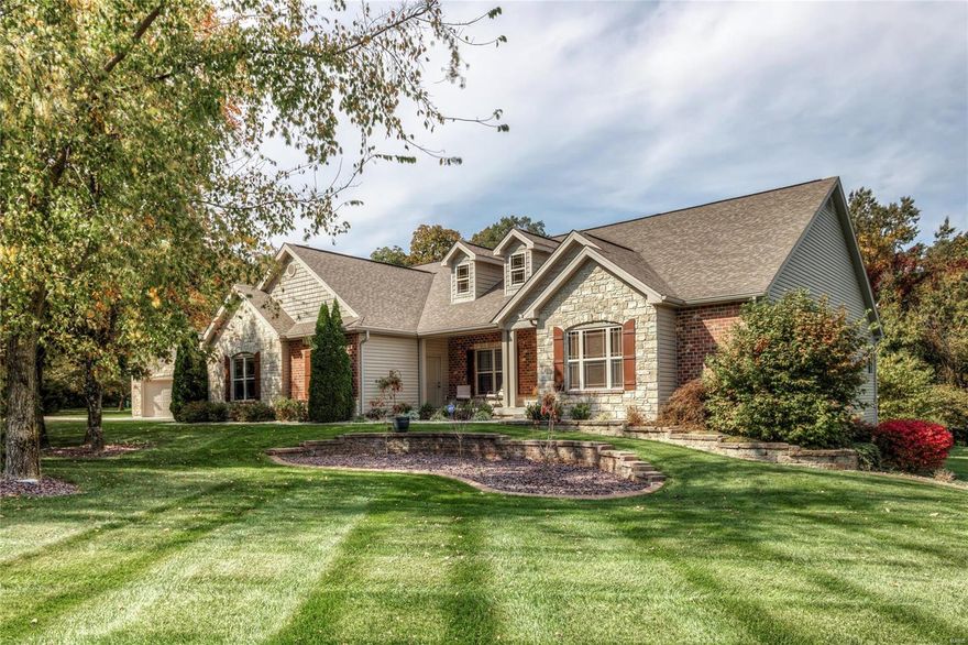 This 3 acre lot is privately nestled on a cul-de-sac and surrounded by plenty of woods. Nature abounds! Immaculate custom built split ranch style home with 5,000+ sq. ft. of living space, 4 bedrooms, 3 full/2 half baths. Details are not lacking! Open floor plan, large master bedroom w/sitting room, two walk-in closets, custom built bath with walk-in shower, granite sinks. Kitchen overlooks pool/outdoor kitchen/fireplace, custom cabinetry, wood flooring, upgraded appliances, breakfast bar/granite, hearth room w/fireplace. Finished walk-out LL is the ultimate entertaining space with theatre area, full bar w/built in refrigerator, work out room, wine cellar, safe room, conveniently located back stairs to garage & workshop room. Carriage house is perfect for additional space to be used how you wish or can easily be converted into an in-law quarters. Home backs to privately owned land so nothing will be built behind or around property and super close to Broemmelsiek Park. Must see! Additional Rooms: Wine Cellar