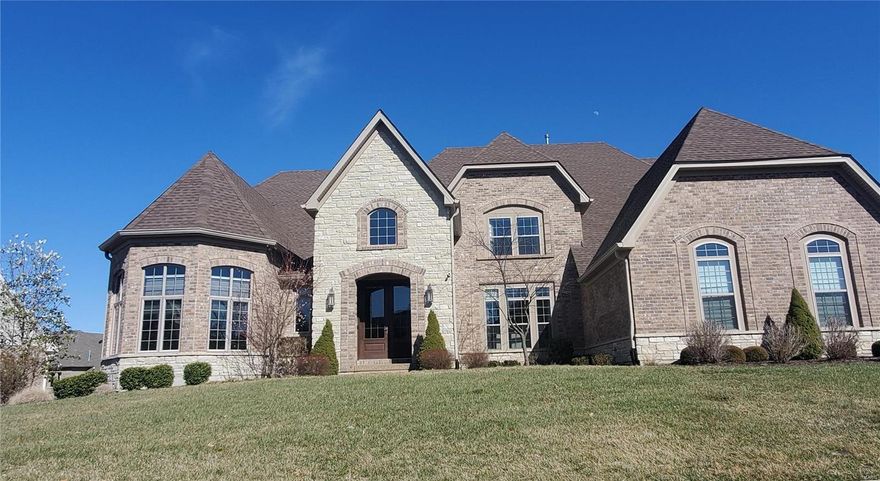 This lavish home is full of love and positive energy from its owners. This former display located inside gated community is loaded with upscale features. The meticulously selected high-end materials along with design and architectural features make this home truly unique. Overflowing with natural light 2-Sty limestone foyer leads from the Great Rm with wall of windows, hearth with gas FP to exquisite kitchen/brkfst area and open staircase. Main floor master suite is fit for a King and Queen with coffered ceiling,master bth and"Celebrity"size custom closet. 2nd floor has 3 bds, 3 full bths and bonus loft room. Finished basement with granite bar, guest bd and bth, open area. Find everything you need for your active and healthy lifestyle within your property: from a professional gym, sauna, steam room, hot tub to heated swimming pool and even a mini hockey rink! Special features include Sonos zoned sound system, remote control e-curtains and private back yard. Come experience luxury!