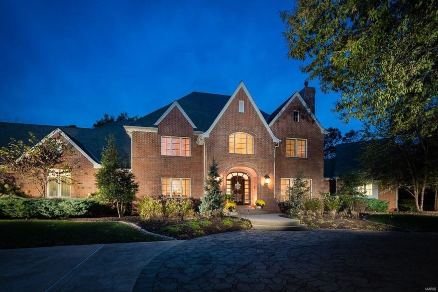 Like New!  This exceptionally designed residence allows for comfortable  living and  entertaining. Nestled on over 3 acres on a private cul de sac.  Very open/bright/ and inviting home.   Center of home features well designed wet bar area plus butlers pantry ideal for entertaining!  Great kitchen opens to hearth rm and large Veranda.  Magnificent master suite on main with custom bath/steam shower and soaking tub, great closets and laundry area!  4 ensuite bedrooms on second.   Main floor also boasts a 15x14 homework/craft rm could be a 6th bdrm suite.  2 coat closets/locker rm and a laundry room!  Prof fin LL with rec room / family room area / exercise room and full bath!  Tons of storage.  This is quite possibly the prettiest lot in prestigious Huntleigh Woods.