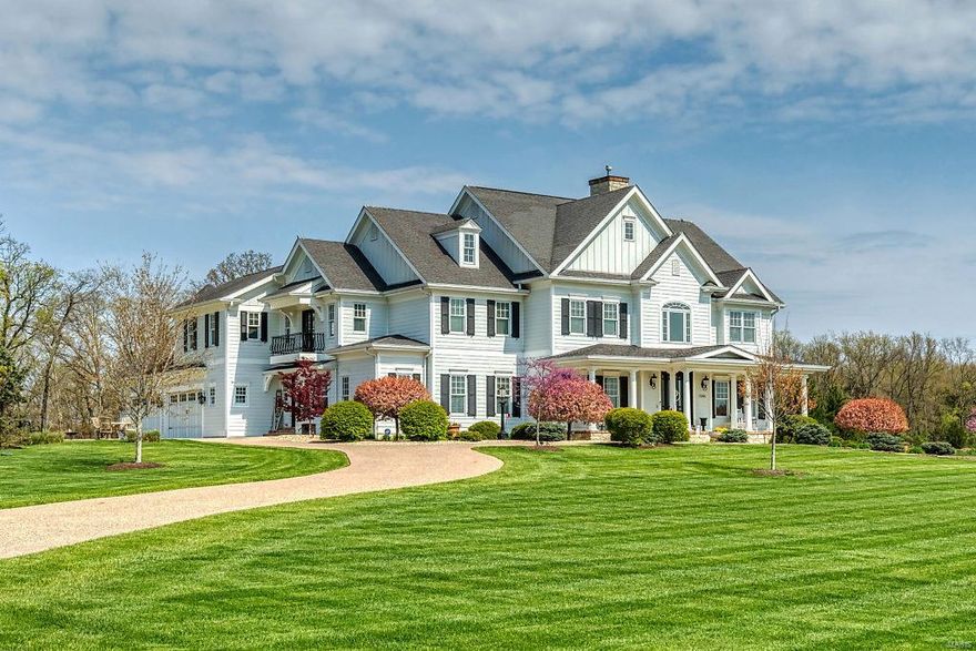 This stunning modern farmhouse exemplifies classic architecture with a fresh perspective! Over 5800 sf of living space enhanced by wide plank cherry flooring, extensive millwork, 10’ ceilings & custom built-ins. 2-Sty foyer highlighted by architectural columns leads to elegant dining room & spectacular great room with marble fireplace flanked by built-in bookcases. Designer kitchen with glazed buff cabinetry, granite countertops, premium appliances & butler’s pantry adjoins breakfast room with wide bay window & hearth room with floor-to-ceiling brick & stone fireplace. Private in-law quarters include bedroom with ensuite bath & sitting area. Master bedroom suite with office, sitting room with balcony & beautifully-appointed bath with shower spa plus 3 additional ensuite bedrooms & bonus room complete the 2nd floor living quarters. French doors open to outdoor living room, 2 patios & hot tub surrounded by landscaped gardens. Wooded 3-ac lot with 4-car garage & 20’x14’ storage building. Additional Rooms: Mud Room