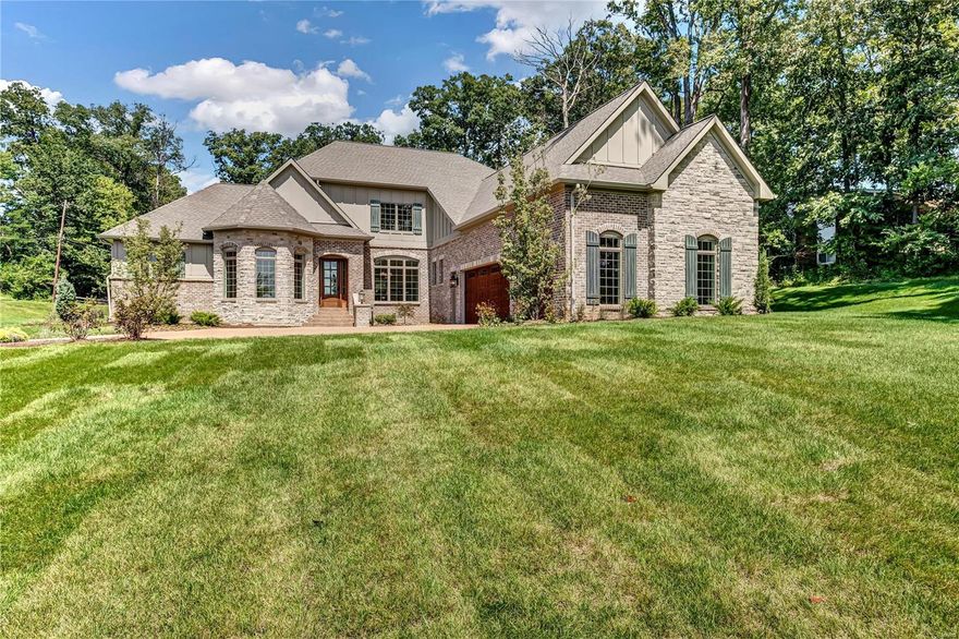 KEMP SIGNATURE HOMES presents this uniquely designed and masterfully built residence now completed and sitting on a 1+acre lot in Town & Country in a private 3 lot subdivision off Conway Road. This SMART technology home is for discerning buyers who appreciate the luxury & legacy of quality construction. Popular 1.5 sty plan boasts 4729SF of modern luxury meeting todays functional living space. Deluxe amenities include;brick/stone elevation, gourmet kitchen w. state of art appliances, granite & quartz counters generous living areas, fabulous outdoor covered living room, luxury master suite w. amazing huge w/in closet (shelving allowance), 10' & 12' ceilings, 8'interior door on main fl., security system,9'basement pour (optional finish plan),great rm.w. fireplace, study, bonus room, drop zone/cubbies, many upgrades from Kemp standard features included. 1,200 s.f. fin. LL w. bedrm,bath,rec room and wet bar. Fully landscaped & sodded, alarm system, irrigation system. Immediate occupancy!