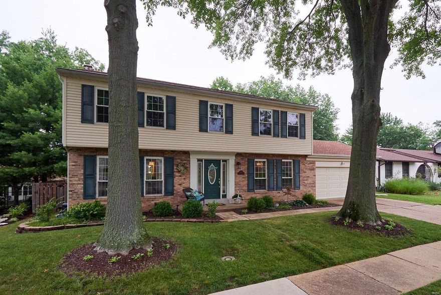 NEW PRICE!!
Incredible opportunity in South County! This two story home has numerous updates and a fresh coat of paint! Walk in the entry foyer and you will recognize the traditional floor plan. However, this layout has the much desired open living room to the family room. The fireplace in the family room is flanked by built in book shelves and cabinetry. There is also a wet bar for entertaining. Step past the updated half bath and into the kitchen area. Granite counters, tile back splash, and a planning desk are just a few of the features of this room. When hosting friends and family this summer, there is great overflow space on to the stamped concrete patio area and fenced yard. The upstairs has 4 bedrooms, one of which is the over sized master suite. The two upper level refinished bathrooms are going to eliminate any fears of "weekend projects." If that isn't enough, there is a finished basement as well!