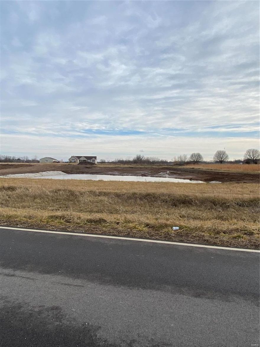 Are you ready to build your dream home? Wonderful 5.19 acre level lot with a new pond. Cul-de-sac lot with gravel or asphalt frontage. Lot is located in an established neighborhood of custom homes. Restrictions are 1600 sq ft on a ranch and 2000 sq ft on 2 story.  Sunsets are dreamy on this lot! Community well and electric is available. 519 of asphalt road frontage. Come check out this beautiful home site.