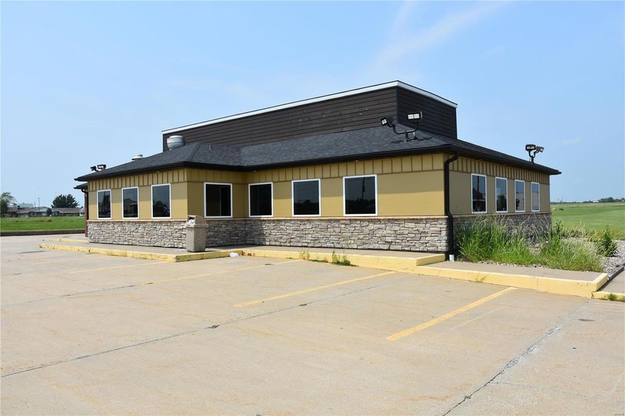 If you are looking for a great restaurant or retail location, this is it!  This commercial zoned property located in the Mark Twain Shopping Center has great visibility and great parking.  To truly get a feel for the property, shedule your showing! Location: Retail Center
