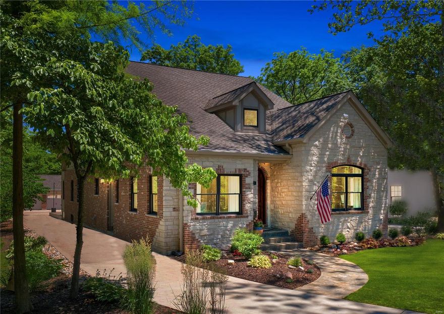 Located on one of Kirkwood's most desirable streets, this beautiful, one of a kind, high end, custom home is a must see! Interior is warm & inviting with 6,000 sq ft of luxurious living space: triple crown molding, wood floors, arched trimmed entries & 8’ doors. Gorgeous chef’s kitchen features  11' center island with unpolished granite top, Wolf & Sub Zero appliances and opens to vaulted great room with brick/stone gas FP. Mn flr mstr suite: WI closet & luxurious bath: double vanities, soaking tub & oversize walk-in shower. LL finished in last 2 years: media, game, exercise, activity & wine room, 5th bed/4th bath. Impressive exterior with brick & stone on 4 sides, solid  mahogany front & side doors & oversized 3 car brick garage.  Lush landscaping, fabulous patio with brick/stone fireplace provide the perfect setting for outdoor entertaining. Just two blocks from restaurants, shops & farmer’s market. Walk to Kirkwood Com Cntr pools, tennis courts & walking trails! Open Sunday 7/5, 1-3 Additional Rooms: Wine Cellar