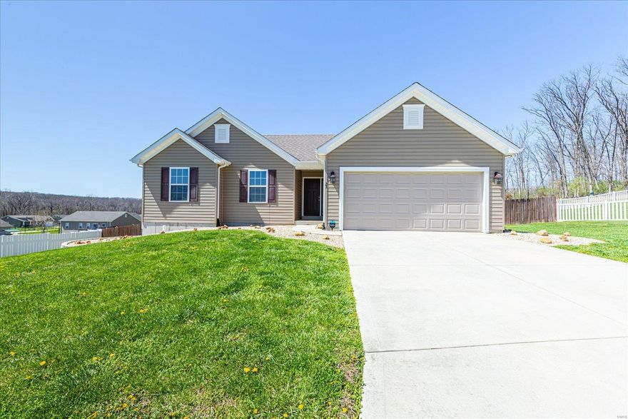 Impressive, 3 BD, 2 BA ranch on a .41 Acre, cul de sac homesite. This 5 yr old home has a 2 car garage, neutral décor and a fenced yard. The ext is low maint with vinyl siding and encl fascia-soffits. Features inc Craftsman-style 3 pnl doors, br nickel door hardware, on-trend wood cabinets in the Kitchen with hardware, micro, sm top stove, D/W, farmhouse style Kit sink, laminate flooring in the Kit-Brkfst Rm, spacious Great Rm with ship-lap accent wall, main flr laundry, Mstr Suite with W/I closet, dbl bowl vanity in the Mstr Bath and more. The unfinished lower level has a R/I bath and look-out window for an easy future finish if desired. There is a deck with steps to the back yard for your outdoor enjoyment and provides you an amazing seat for taking in beautiful sunsets! All electric home. There are buried downspouts directing water away from the home. It is an easy commute to Hwy 40/61, 79, Cuivre River State Park (which covers over 6,400 AC) and more. Eligible for USDA financing.