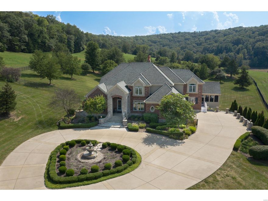 One of a kind property! Stunning, custom built home situated in private setting on approx 101 acres with 5 spring fed lakes and vast open land. Located just 15 minutes from Wildwood, this exclusive luxury estate could also be a perfect country retreat shared by multiple families. Spectacular home sits on a hilltop overlooking acres of beautiful open spaces, lakes and saltwater pool. Gorgeous 2 story entryway invites you into the gracious dining room and custom designed office, leading to living room with floor to ceiling windows and panoramic views of the estate. State-of-the-art Chef's kitchen opens to hearth room with fireplace and large breakfast area.  Peaceful main floor master suite completes the main level. Second level boasts 3 lovely bedrooms, loft and 3 full bathrooms. Fabulous lower level features family room with fireplace and large rec room with custom bar and 2 more bedrooms.  Sale includes road up to the gates and approximately 100 acres containing the home.A unique gem!