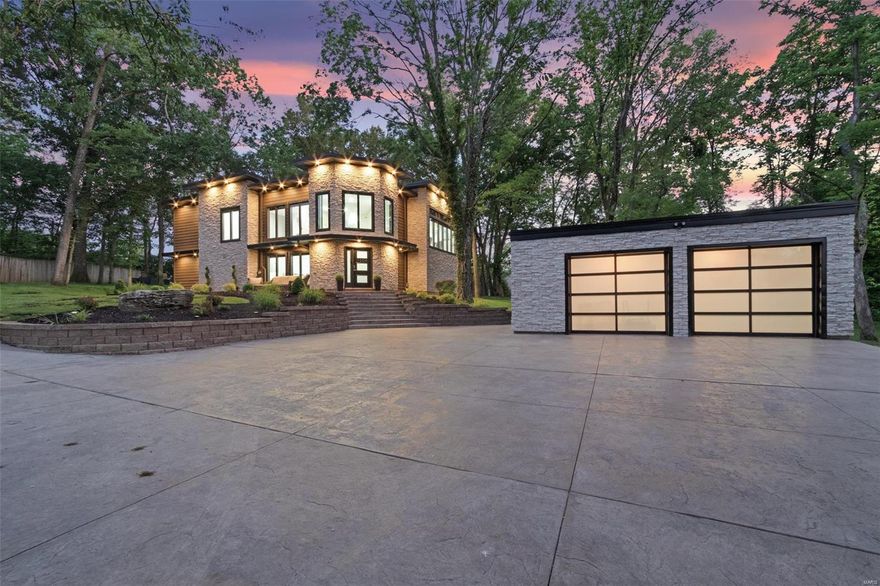 A Kirkwood masterpiece! Completely remodeled 4 bed, 3.5 bath home in the beautiful Sugar Creek area on over an acre of park-like setting. A 2-story entrance hall and open staircase greets you. The kitchen features quartz counter tops, custom cabinets, a professional grade fridge and gas oven/range, stainless farmhouse sink, and more. The kitchen opens to the dining area and main living area. The living room boasts vaulted ceiling, skylights, a stone gas fireplace, and a wall of doors that can open to the outdoor living area. The large patio has a stone fireplace, stone serving area with built-in fridge and gas grill. The main-level master suite has custom closets, large windows, electric fireplace. The master bath is a work of art with a separate room with double showers and soaking tub, double sinks, amazing tile work, more. The upper level has a spacious family room with fireplace. 2 bedrooms with built-in bunk beds, full guest bath, bedroom suite, office, more.