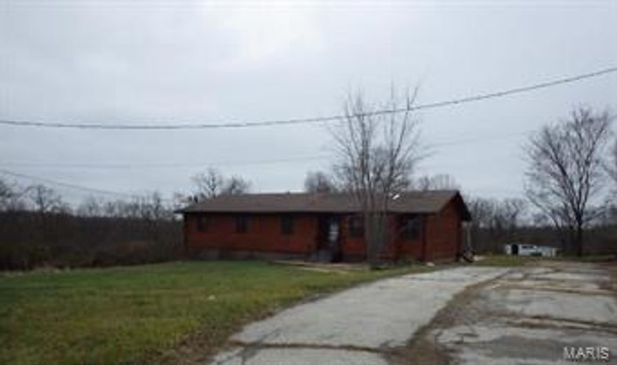 Don't miss this spacious 4 bedroom 2.5 bathroom home with over 1800 square feet!  Home features spacious eat-in kitchen, hardwood floors throughout, beautiful stone fireplace and a large level lot!  This home is waiting for your finishing touches!! Sold As Is. Seller to do no Inspections, make any warranties, or provide any repairs*All offers must be accompanied by buyer's pre-qualification letter or proof of funds. All offers submitted without these documents will not be considered. *Please be aware the seller will choose the place of settlement, closing offices, escrow or attorney. *The seller reserves the right to accept the offer of their choice regardless of the order in which they are received, countered offered or presented from a multiple offer situation. Special addendums required with accepted contract. Special Sales contract only. SpecialListingConditions: Foreclosure