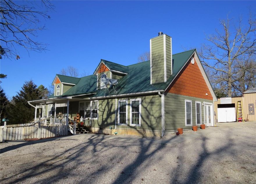 SPECTACULAR 4 bed 3 bath home on 5.52ac just south of Lebanon. This 3800sf custom home features handscraped hardwood floors, 2 fireplaces, a large formal dining room & a kitchen that is simply amazing with it's granite counter tops, center island, 2 pantries, & stainless appliances. The main floor also offers a family room with a gorgeous fireplace, a spacious year round sun room with hot tub & wood stove, a large guest room, & an incredible master suite with custom shower & his/hers walk in closets. Upstairs you will find a sitting area & 2 guest rooms with bath, & the basement provides a storm shelter, large workshop area, & an equally large storage room which could easily be converted to another family room, media room, or game room. Outside, the over 5 acre wooded lot features a HUGE stocked pond, a 3 car detached garage, storm shelter, a 35X44 barn, chicken houses & raised garden beds. This quality built home also has a new HVAC system too! Country setting only minutes from town! Additional Rooms: Sun Room