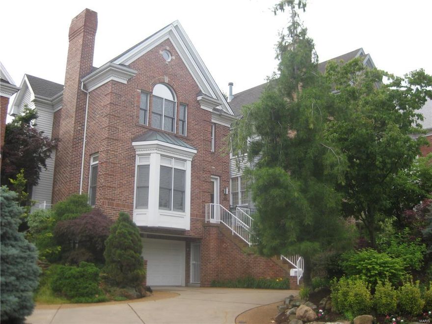 Two blocks from downtown Clayton, Old Town sophistication meets open floor contemporary and upscale finishes in this 23 year old Clayton gem. A marble entry invites you to the sunken living room with marble fireplace or continues to the open concept kitchen, breakfast room and family/hearth room with tons of natural light and views of the stunning back yard. A 10 foot center granite island with 2 Jenn-Air 4 burner cooktops, a commercial fridge & stainless double oven are a chef and/or entertainer's dream! The butler's pantry with wine fridge connects the kitchen to the formal dining room. The second floor provides the master suite with a spa quality master bath, two additional bedrooms with en suite baths and a sitting room with built in bookcases and large skylights. The back yard with the private inground pool and exquisite landscaping is your personal retreat! The lower level features a large rec room, full bath, laundry and a 3-car tandem garage.