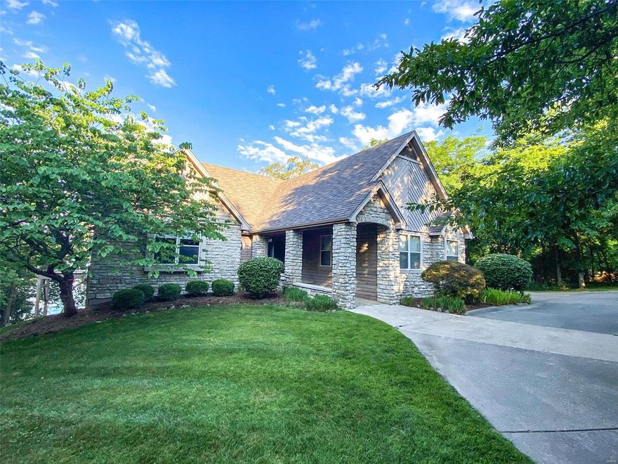 This is the ultimate waterfront property at Innsbrook! Enjoy amazing lake views, from a family friendly home, and all on a private wooded homesite. Best of all, golf course, and clubhouse are all within walking distance! Notice the professional landscaping, circle drive, and covered front porch as you enter. Don't be alarmed if your jaw drops when you open the front door.  The lake views are incredible! Most of the rooms have 8' tall windows. The vaulted great room features a fireplace and professionally installed TV with a separate A/V closet in which some electrical equipment is included. There are 4 bedrooms and 4 baths on the main level. The lower level walkout has 2 bedrooms, 1 full bath, and a large rec room including bar and pool table. The lot has 129' of shoreline on premier Lake Aspen.  Enjoy fishing, swimming, and boating from the lakeside patio. It's also a great spot for the annual Fireworks Show! This is a unique property with exceptional placement of the home.