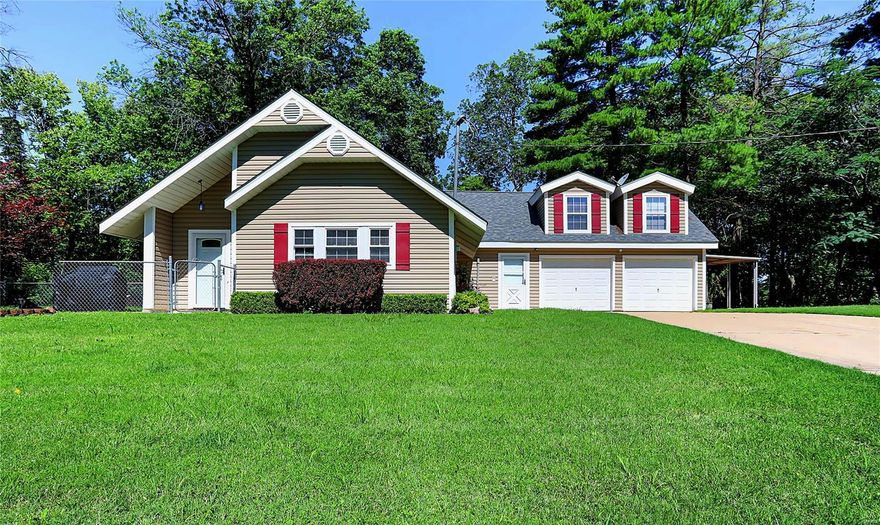 Enjoy peaceful living in this move-in ready home with lake access! The main level features an open family room, kitchen, dining area, bedroom, full bath, and a convenient spacious laundry/utility room off the 2-car garage. All appliances stay! The loft-style upper level adds character to the home and boasts 2 more bedrooms and bathroom! Outside, a carport offers additional parking space for your vehicles and toys plus a newer shed for additional storage. The property includes a big, beautiful yard spread over 2 parcels. Within the Hermit Hollow community there is access to a large lake and 100+ acres of common ground to enjoy! For peace of mind, an HSA Home Warranty is included. Easy, quick drive to HWY 44 and a short, charming drive to the quaint town of Labadie-this home combines serenity with convenience-come see it today!