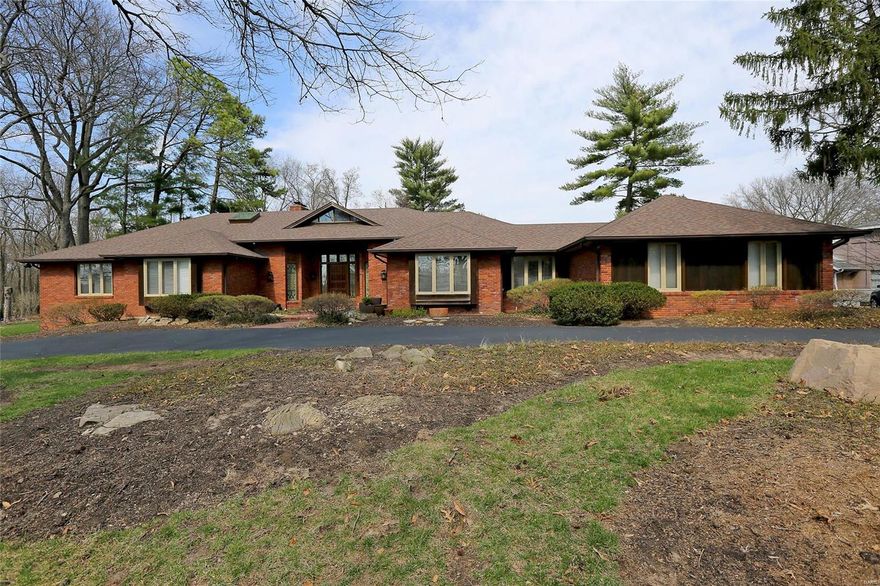 This Sprawling Brick Ranch"Estate" boasts 5800 Square feet of total living space on a spacious lot of.92 Acres which includes 4 bedrooms, 5 bathrooms, 2 fireplaces, a 3 car garage, a professionally finished lower level of over 2400 Square Feet and an inground pool in the sought after established community of "Ladue Farm Estates"! This home has a very open floor plan with lots of natural light throughout the home with scenic views of mature trees from every window in the home. Gourmet kitchen offer a gas Viking Cooktop, Dacor double ovens,built-in Microwave, granite countertops and center island.(stainless steel appliances).Ceramic tile and Gleaming hardwood floors through out the main floor. Home offers in-ground sprinkler, pool house, Hot tub, and main floor laundry! The lower level offers an additional bedroom,2 baths,26X20 recreation rm and 40X19 family rm, a woodburning fireplace,a gorgeous bar area w/ full refrigerator,sink and granite countertops!