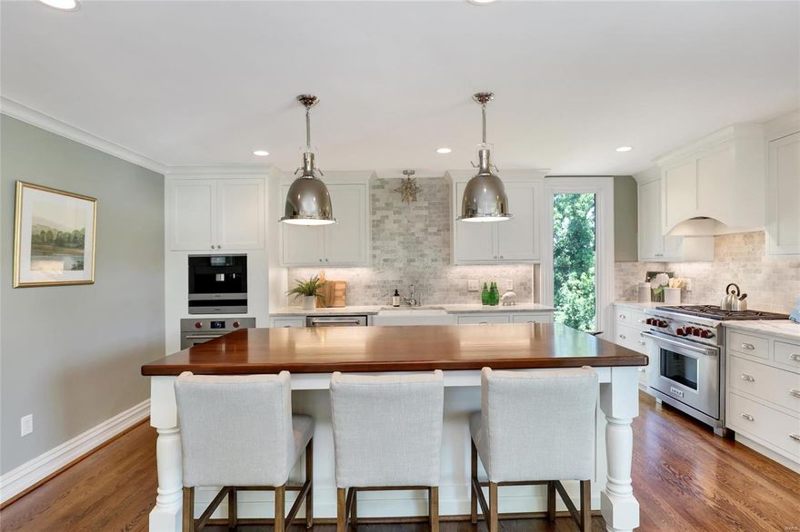 PENTHOUSE CONDO on a PRIVATE, GATED street in the CWE just 1 blk. off Euclid with a PRIVATE ELEVATOR THAT OPENS INTO YOUR HOME! Hardwood floors throughout, generously-sized LR/DR w/ motorized window treatments & new gas frplc., cook's dream kitchen w/ built-in Miele coffee/expresso center, huge island w/ mahogany top & seating for 4, Carrara marble counters, 6-burner Wolf gas range + add'l Wolf wall oven + SUBZERO fridge adjoins light-filled FR w/ 2 walls of floor to ceiling windows over looking the yard + 150 bottle SUBZERO wine cooler & built-ins. Private deck off FR is ideal for al fresco dining or relaxing. Spacious master suite w/ walk-in closet, spa-like, en suite bath w/ 2 ROBERN medicine cabs., free-standing soaking tub, walk-in marble shower w/ frameless door, dbl. bowl vanity & custom cabinets. 2 add'l bdrms, hall bath w/ CARRARA marble dbl. bowl vanity & floor. 3rd bdrm/library has built-ins & a charming non-functional frplc., 2 CAR GARAGE. Walk score 85! Location: City, Corner Location, Upper Level