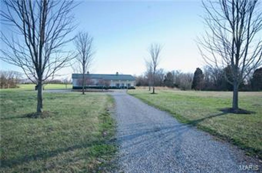 If you are looking for a large tract with tremendous hunting, excellent access and close to home...this is it!  Look no further! This property has it all!  Comfortable accommodations in the metal Morton building that serves as a hunting cabin and machine shed all-in-one!  Tillable fields provide food for the deer & turkey plus a little income! Additional tillable areas provide for excellent large food plots upon which to hunt.  Multiple water holes, mature timbered ridges, deep draws and brushy cover make this farm outstanding for Trophy Whitetail management! Truly outstanding investment and perfect for your Tax Deferred Exchange! Blacktop access which turns to gravel a short distance past the farm means very little traffic!