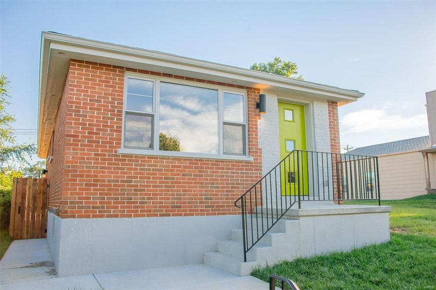 3 Bed, 2 bath mid-century modern home in Botanical Heights. Detailed renovation features all new infrastructure, finishes and fixtures. Open floor plan makes 1,400 SF feel much larger. Solid oak flooring and bright color palette create a vibrant living space.  Living rm, kitchen, full bath, master bed w/ walk-in closet and second closet on 1st level. Basement level includes: Two additional bedrooms with spacious closets, a second full bath w/ double sink, laundry rm and large linen closet.  Oversized 2-car garageport offers refuge for vehicles and an option for outdoor flex space when entertaining.  The only thing missing is YOUR Eames Lounge Chair.  TAX ABATED FOR 10 YEARS. Very near City Garden Montessori School, Olio and Elia Wine Bar and Restaurant, Union Loafers Café and Bread Bakery, Sasha’s on Shaw and MO Botanical Gardens.