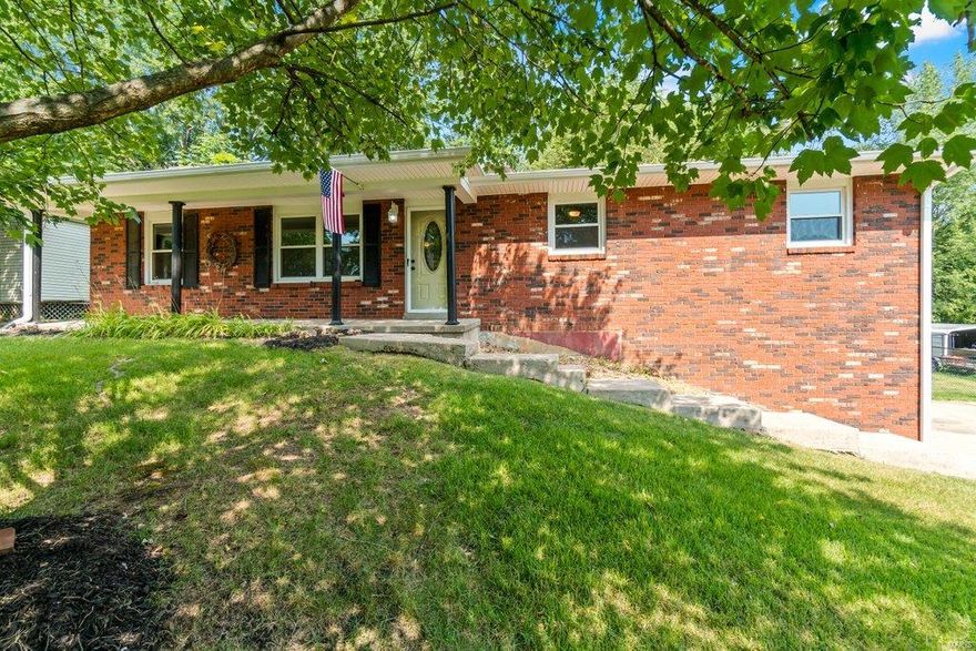 Bright, remodeled to perfection and great curb appeal!  The main level of this home features a brand-new kitchen with new cabinets, countertops, backsplash and appliances, new paint and lighting throughout and mostly new flooring.  The main level also has a living room, 3 bedrooms, 1.5 bathrooms and a family room which has a woodburning fireplace, place for your dining room table and large sliding doors that lead out to a fenced-in backyard.  The basement family room has been completely renovated with new flooring, paint and ceiling tiles.  The oversized garage also walks out to the backyard.  Washer and dryer hookups are located on each level and the front-loading washer and dryer stay with the home.