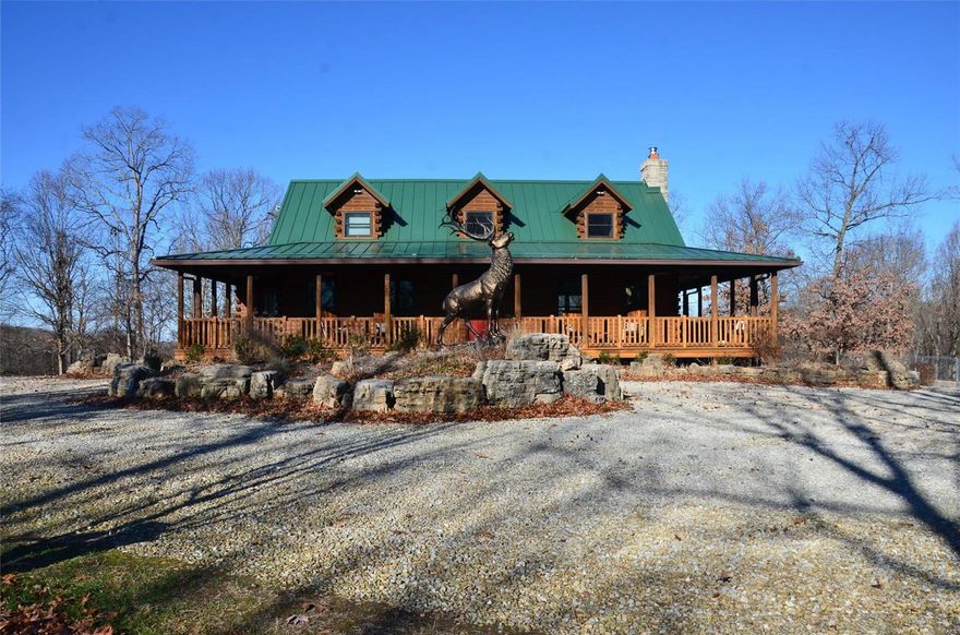 This spectacular property is located just a few minutes north of Richwoods along Highway 47. Follow the scenic private drive back to the beautiful 3,000 square foot finished log home. This beautiful home also has a detached two-car garage, a 2,700 square foot horse barn with six horse stalls, and two fenced-in dog parks. Follow the trail back through the beautiful timber to the fully stocked 6 acre +/- lake. At the lake, there is electricity, a water well, a boat dock, and 225 square foot pavilion. The lake area also offers you a small portable cabin for your campouts at the lake. This property also offers you miles of trails going throughout the property. These trails will lead you to numerous food plots and deer stand locations and could be utilized for hiking or enjoying hours of fun ATV riding.