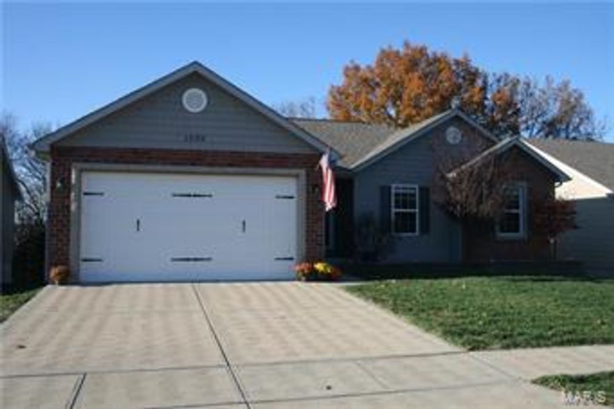 EXQUISITE 3 br/2 full bath Ranch in Jefferson County.  This home has much to offer:  main floor laundry, beautiful hardwood floor in entry way through living room, kitchen has custom cabinets w/ remarkable ceramic floors and deck off the kitchen perfect for grilling, tray ceilings in living room and master.  There is a  full walk-out basement w/rough in.  Patio just outside of basement leading to flat yard that backs to woods.  Upgraded carpet that was installed a year ago along with newer laminate.  Located in Providence Subdivision w/ Community Clubhouse, Swimming Pool and Tennis Courts.  Come make this house your new home today!