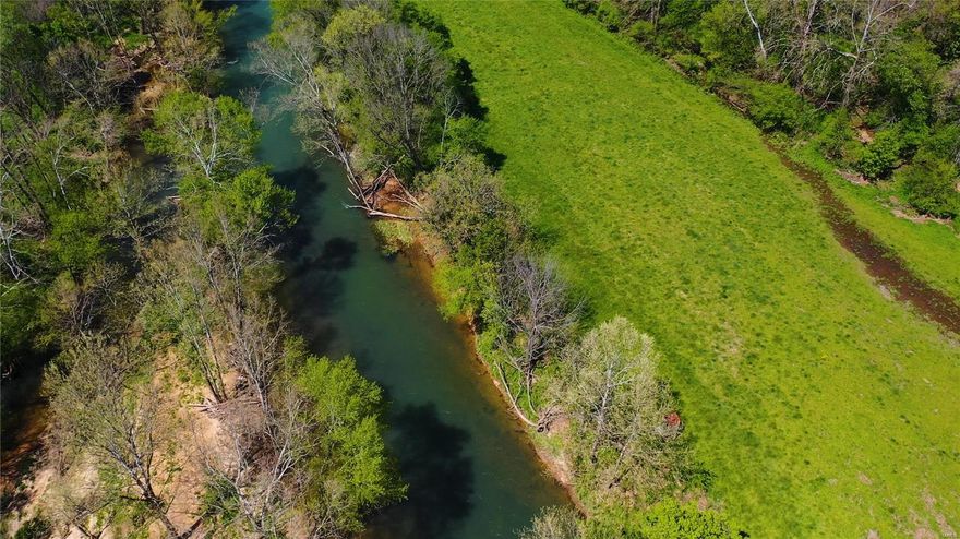 1.5+/- miles of Big Piney River frontage w/home,pastures,woods & a cave! Prime Hunting Property that Joins Mark Twain National Forest across the river! You can jump in your kayak/tube & float to Boiling Springs!There are cliff-top views & level access to the river w/recreational paths cut along the banks & through the woods. The creek through the property feeds into the river.There's a myriad of uses:family farm,commercial retreat,development,hunting property,family compound,recreational business w/canoeing,kayaking etc.Property is approximately 1/2 open & 1/2 wooded w/marketable timber.Hunting stands/huts are set throughout the property.The 4 Bed,2 1/2 Bath home, w/unfinished basement, is built for entertaining/full time living.The main kitchen has a large dining table.The second kitchen is on the main living level.Large master suite & other bedrooms.There are 2 living areas plus 3 porches.Shop holds all of the needed equipment to manage the property & RV storage. 


 Single View