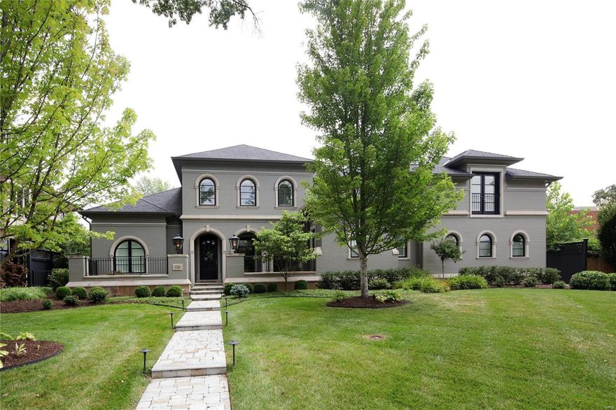 Premier location in Old Town Clayton, extraordinary 5-year-old custom home on one of a handful of double lots w/ 100’ frontage. Around the corner from restaurants and boutiques. Main level master suite w/ His & Her walk-in closets features 13’ coffered ceiling and bath w/ soaking tub and 5’ x 5’ marble and glass shower. Features throughout main floor include: 10’+ ceilings, recessed lighting, multi-piece crown molding, extensive millwork, cased openings, & 7” baseboards. Gourmet kitchen w/ 5’ x 9’ center island has white Everest Quartzite counters, white Shaker style custom cabinetry w/ exposed hinges, Wolf, Subzero, and True appliances, Breakfast Area, w/ access to Family Foyer and Dining Rm. 3 additional bedrooms w/ en suite baths & walk-in closets, 1st & 2nd flr laundry, finished basement, geothermal heating and cooling, covered front porch, courtyard w/ gas lanterns, outdoor living rm w/ fireplace, pool, pool house w/ powder rm/changing rm, auto court w/ two 2-car garages on grade!