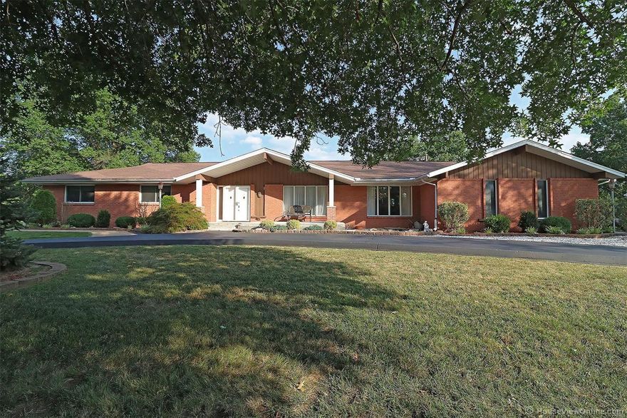 Spectacular home with unique features in prime Lindbergh school district. Custom kitchen cabinets with granite countertops and downdraft. Main floor laundry & second one in the basement. Tons of special features not seen in the average home, including rollaway screens on French doors leading to the back deck. Custom window treatments throughout the home. The outside of the home features a grand staircase off of the deck overlooking the pool and the beautiful woods. The pool has a slide, diving board & pool heater. Side entry garage also has a heated & cooled workshop attached. This amazing home features two large bay windows that overlook the beautiful manicured lawn with relaxing views to the common ground wooded area. The finished basement features a great room for gatherings. The basement has a full bath with swing out glass shower partition, a bedroom, office and cedar closet. Full year Home warranty included.  See this gem in a highly desirable neighborhood as it won't last long!