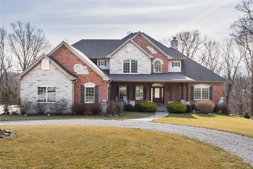 This exquisite 3460 sqft 1.5 story home sits on 51.89 ac. in the rolling hills of Augusta.  No details were spared building this custom 4BR, 4.5BA private oasis. Relax in your expansive great room next to the dry-stacked stone fireplace.  Floor to ceiling views for miles.  Open floor plan flows from large dining area into kitchen w/granite counters & breakfast bar.  Entertain guests on the screened-in porch off dining room, opens to maintenance free Trex deck along entire back of house, overlooking pond. UL has large BR suite, 2 add'l BR share Jack/Jill BA.  High end finishes & features include, custom cabinets with underlights, crown moulding, oak flooring, coffered ceiling, geothermal heating, heated garage, germicidal UV light, cent. vacuum, Cat-5 wired, 6" ext. walls, Large Out blg. MF master features 2 custom walk in closets and luxury BA that opens onto deck. A mix of mature, mast producing hardwoods, flat open plots, provide excellent habitat for whitetail & turkey populations. Additional Rooms: Mud Room