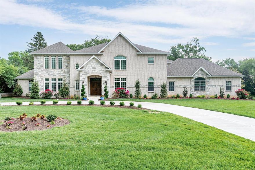 Completed in 2019, this expansive 6 Bedroom, 8 Bathroom Frontenac home offers over 9,000 sqft of luxury living space. Includes all of the sought after amenities: 10+ ft ceiling heights, mainfloor Master Suite, addl main floor en suite bedroom, gourmet Kitchen w SS appliances, massive walk-in master closet, 5 car garage & Ladue Schools.  Other features:  hardwood floor throughout main level, custom wood paneled doors, marble & stone fireplaces in Great Room, Master Bedroom & Hearth Room.  Eat-in Kitchen allows tons of space for everyone to gather and hosts SubZero fridge/freezer, built-in espresso machine, Kohler farm sink, giant center island w storage, bar sink, & beverage fridge. Master Bath inc dual sink vanity w 2 Kohler painted stone sinks, freestanding jetted soaking tub, separate makeup vanity, water closet & O/S marble tiled shower.  4 add bedrooms upstairs w another large family room perfect for movies & games..Security system, 3zoned HVAC, 2000+ sqft of finished lower level. Additional Rooms: Mud Room