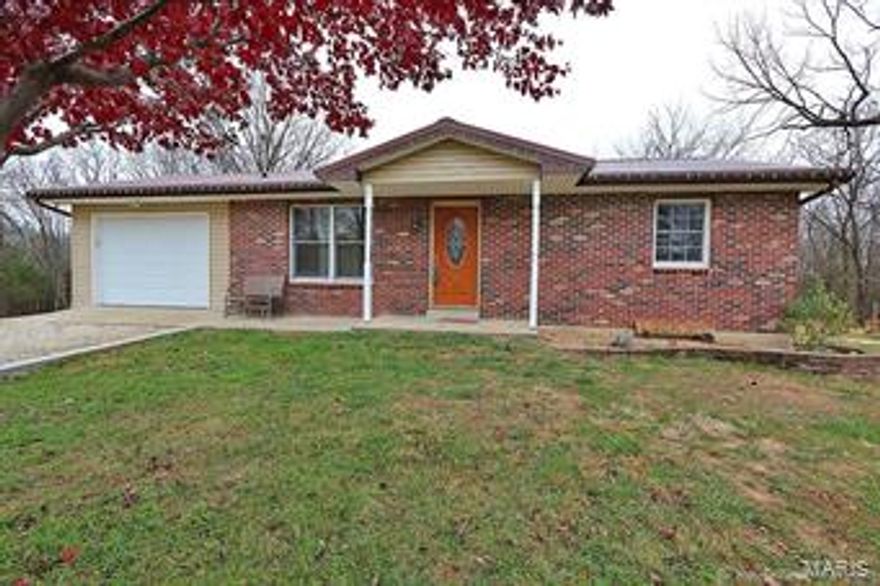 If you are looking for you own piece of the country look no further! This updated home sits on 12.58 acres and has a 30x40 outbuilding great for storage, workshop or recreation and has it's own heat source. This great ranch home with basement has a steel roof with a class A impact rating the will help cut your insurance rates. This is a great property to enjoy with you family for the large deck, playset for the children and 4 wheeler trails. This would be a great place to call home! This home is located within a short distance of highway 67.  Call for a showing today!!