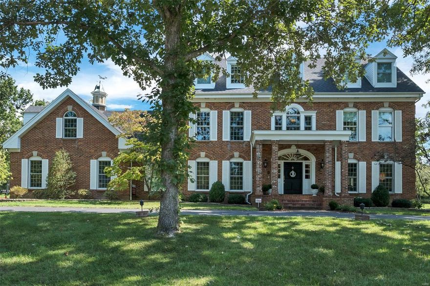 You will fall in love with this stately 4 sided brick home the moment you drive up. Flat 1 acre lot w/ mature trees creates your own private oasis. Remodeled kitchen boasts 42 inch cabinets, island w/5 burner Bosch gas cook top, Bosch double ovens, 2 pantries, butler's pantry, sub zero refrigerator, & bay window. Main floor mud/laundry room has built-ins, 1/2 bath, storage closet, & door to the pool. Family room has a gas fire place, built in book cases, & wet bar. Master bedroom has 9 foot ceilings, Carrara marble fireplace, detailed mill work, walk-in closet, & renovated master bathroom (2019). There are 3 additional bedrooms w/ 2 more full baths & optional 5th bedroom/playroom. Other features: over sized 3 car garage, newer Marvin windows, newer roof, refinished hardwood floors, newer carpet, circle drive w/ huge parking pad, salt water pool, in-ground sprinkler system, central vac., detailed mill work throughout, & upper level concrete sub floors. Neighborhood backs to Queeny Park. Additional Rooms: Mud Room