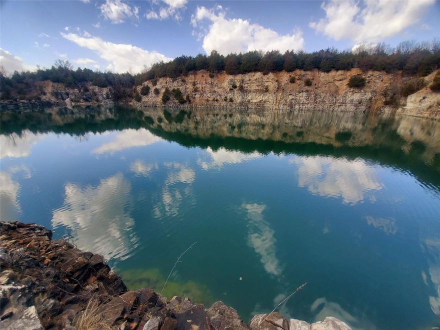 Unprecedented opportunity here - 237 secluded acres that have been minimally hunted, a 5-acre deepwater lake with boat access, approximately 42 acres of cropland in production now, all just minutes from Mark Twain Lake. The deepwater lake is stunning, with crystal clear water and rock peaks you'll think you are in a national park. Traveling this farm you'll notice deer sign everywhere. With several smaller ponds, Dry Fork meandering through the property (running directly to Mark Twain Lake) and being surrounded by bigger crop fields this is a haven for wildlife with plenty of cover & water on site. This unique recreational opportunity offers secluded hunting & fishing, as well as tillable income. The tillable acreage is leased on a year-to-year agreement. Make this your weekend getaway or gorgeous rural home site with electric there & water at the road. Or take advantage of the unlimited development potential here -it would make an ideal destination for cabins, campers & more.