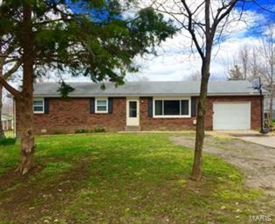 Brick Ranch with 3 Bed, 1 and 3/4 bath, 1 car attached garage, corner lot near schools, bathrooms updated in 2015, new flooring in kitchen 2015, hardwood in 2013, brick fireplace, 50 inch flat screen over fireplace included, fenced in yard, portable building/dog house stay, stove, dishwasher, and fridge included, above ground pool negotiable, deck wood replaced 2012, walk-in closets, new counter tops 2015, 6 of 11 windows replaced 2014, dishwasher new 2014, $500 interior door allowance, Owner-Agent
