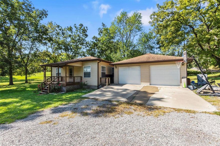 As you pull up to this charming home, you'll immediately notice the spacious yard that spans two lots, providing plenty of room for outdoor activities and potential expansion. Nestled in a peaceful and quiet neighborhood on the outskirts of town, this property offers a serene escape from the hustle and bustle. As you step inside, your attention will be drawn to the stone gas fireplace, which serves as the focal point of the living area. The combination of the fireplace and open layout sets the stage for cozy and memorable moments. The large master bedroom is a true retreat, featuring a walk-in closet that offers ample storage space. The private master suite bathroom adds to the convenience and comfort of this space.  Sellers are providing a $5,000 allowance for home renovations to make it your own.  Don't miss out on the opportunity to make this special place your own – schedule a viewing today and experience the charm of this home for yourself!