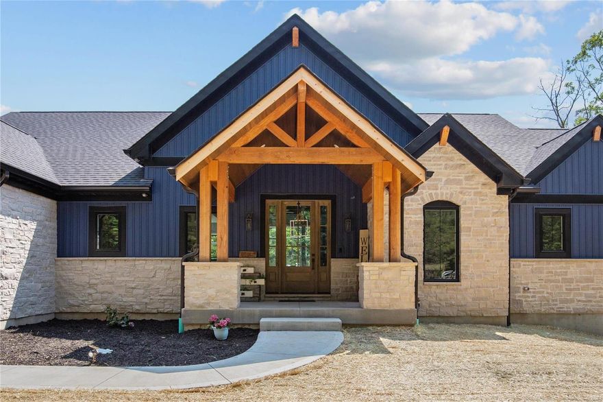 Welcome to this REMARKABLE 10 month old Defiance home built by Work Horse Construction with 4 bedrooms, 3.5 baths & oversized garage on nearly 9 acres! Enjoy breathtaking views, open floor plan, luxury plank floors, soaring ceilings & tons of natural light. The great room is a WORK OF ART with wood beams & STUNNING stone fireplace flanked by built-in bookcases. The EXQUISITE kitchen boasts custom cabinets, backsplash, pot filler & quartz counters. The mudroom cubbies are perfect for household organization & the laundry room is a dream with loads of cabinet space. The owners' suite is a TRUE OASIS with fireplace, enclosed porch, walk-in closets & LUXURY master bath with dual vanities and custom shower featuring multiple shower heads. The 2nd bedroom & ensuite bathroom are ADA compliant should you have the need. The lower level adds a living room, bar, gym & library/wine room. You will also find 2 bedrooms & bathroom with dual vanity & tub/ shower combo. Schedule your showing TODAY! Some Accessible Features Additional Rooms: Mud Room, Wine Cellar