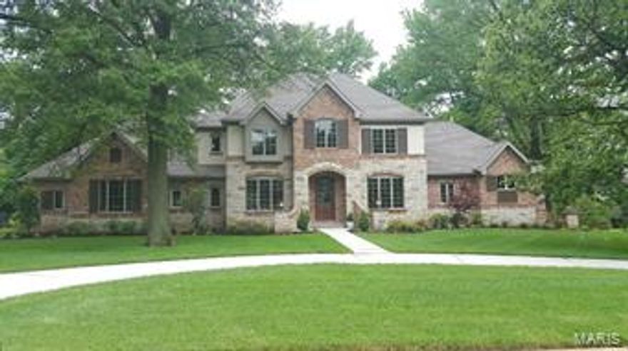 Another Signature Flower Custom Home in a great location is nearing completion.  This special design takes advantage of the beautiful homesite.  The New 1.5 Story home is currently under construction. A custom front elevation is sure to impress. 4 car side entry garage, circle driveway, 3 zoned heating and cooling.  Grand foyer is flanked by dining room and Great room and sights thru to dramatic Hearth Room and covered rear patio.  The homesite is perfect for a pool.  The large, gourmet kitchen incorporates the hearth room for a grand entertaining space.  Main floor, Luxury Master Bedroom suite has a custom coffered ceiling and sumptuous master bath.  A second 1st floor suite is great for in-laws or home office. 3 large bedrooms, 3 full baths and a loft are located on the 2nd floor.  In the walk-out lower level there is a Theatre room, rec room, family room, large wet bath and a full pool bath.  Lots of attention to detail and finishing touches will make this new home a great choice.