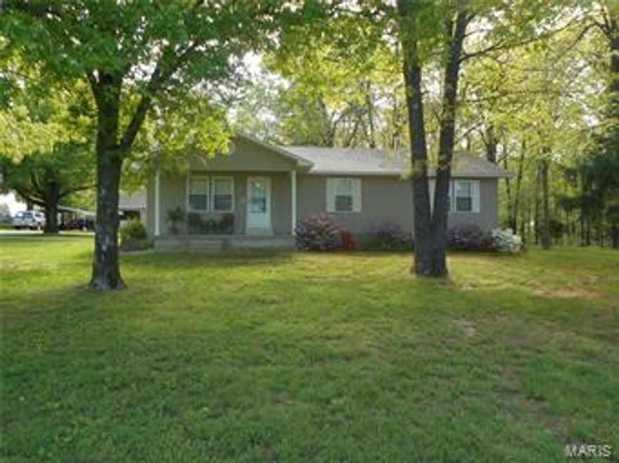 Country living at its best! Immaculate 1456 sq ft, vinyl siding, 2/3 bedrooms, 1 3/4 baths, office area can be converted to 3rd bedroom, CH/A, ventless heater, appliances stay, double hung vinyl  windows, storage building. Separate 30x34, 2 car heated and cooled shop/garage with commercial exhaust fan, extra portable carport. Sitting on 6.3 surveyed acres. $159,900