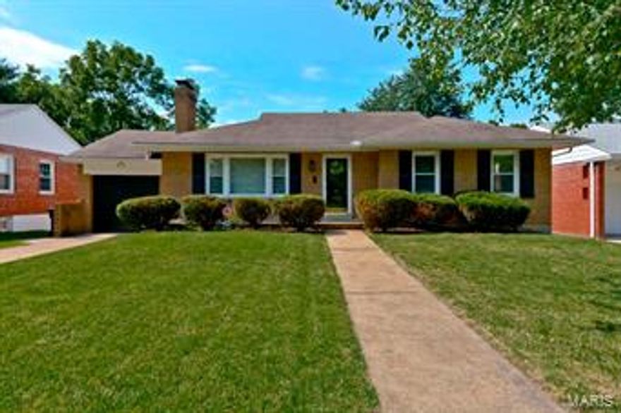 Cute as a button starter home or perfect for a downsize!  Spacious living room with gas fireplace and lovely mantle leads to separate dining room and on into the updated kitchen w/white cabinets and black granite counter-tops.  There's been a counter/buffet added for extra room serving guests.  Both bedrooms are on the main floor and boast plenty of windows and great light.  But for the kitchen and bath the entire main floor has lovely hardwood floors and the living room has coved ceilings.  The LL has served as exercise space, there's plenty of storage and an additional full bath.  There are steps to the attached garage from the house making bringing in those groceries a snap in the rain and snow!  From there is a beautiful deck just begging to hold a dinner party or family/friend gathering. This house is in a trust and is being sold in its present AS-IS condition; the seller will provide no inspections nor make any repairs.  13 mo HWA Home Warranty provided to buyer at closing.