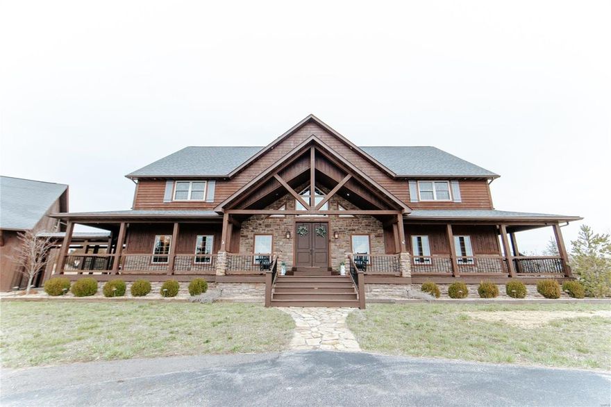 Grab your kayaks and fishing poles!
This INCREDIBLE *one of a kind property* is up for grabs! 
This stunning lodge was built in 2011, and is completely custom inside + out! 
Boasting a massive living space with a window wall, vaulted ceilings, & wood beams throughout!
Home also features a beautiful rustic + country kitchen, 5 bedrooms, a loft space, 4.5 baths, a finished walk-out basement with a bar, theater room, and tuck-under garage! 
Don't forget the detached 3 car garage, with an upstairs barn loft, and enormous 60X80 shop with a lean-to, 4 garage bays and 4 man doors! 
You will not want to miss this absolute DREAM HOME, sitting on 15+/- acres with a lake view out back, and a quarry! Call TODAY for a private tour!