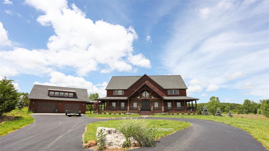 Grab your kayaks and fishing poles!
This UNBELIEVABLE *one of a kind property* is up for grabs! 
This stunning lodge style home was built in 2011, and is completely custom inside + out! 
Boasting a massive living space with a window wall, vaulted ceilings, & wood beams throughout!
Home also features a beautiful rustic + country kitchen, 5 bedrooms, a loft space, 4.5 baths, a finished walk-out basement with a bar, theater room, and tuck-under garage! 
Don't forget the detached 3 car garage, with an upstairs barn loft. 
You will not want to miss this DREAM HOME sitting on 15 acres with a lake view out back, and a quarry view including beach/water access in your very own front yard!!! Call us TODAY! Additional Rooms: Mud Room