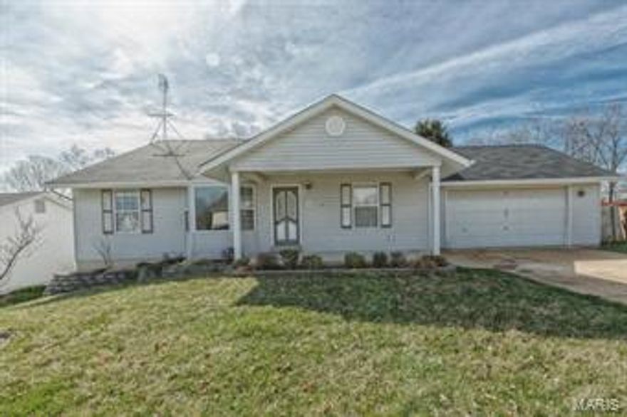 Move in ready 3 bedroom 2 1/2 bath home in great subdivision.  The main floor offers huge vaulted great room with new carpet and has been freshly painted throughout.  Dining room right off the kitchen with new carpet opens to the spacious kitchen with plenty of cabinet and counter space.  Divided floor plan Master bedroom w/ ceiling fan and master bath with separate shower and tub on one end of the home and 2 additional large bedrooms with great closet space.    Walk out lower level is partially finished with two rooms.  One can be used as a bedroom and also offers a half bath.  The yard is fully fenced and has a nice size deck off the main floor.  Other features include main floor laundry, new roof, new siding, some new windows, fresh paint, new carpet and newer systems.  Home is being sold as is but is in great condition.   Hurry!