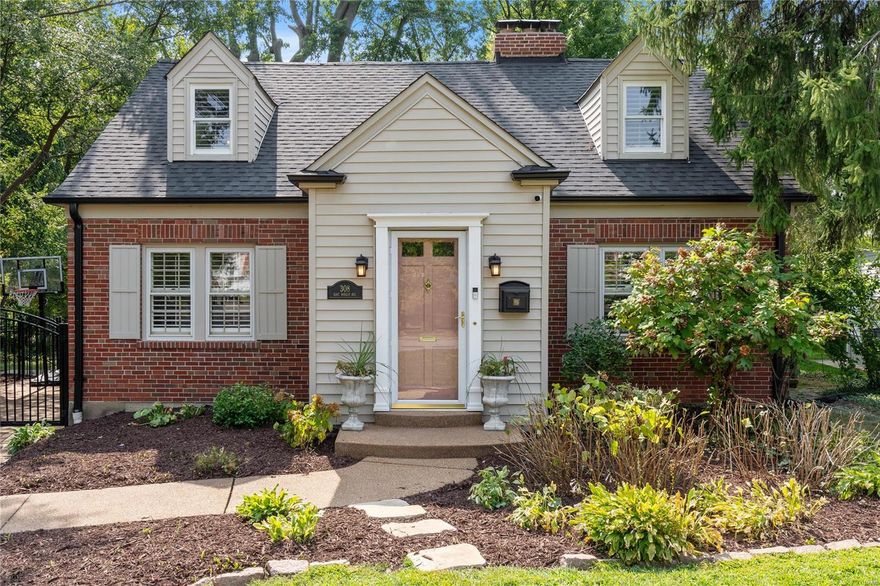 Welcome to 308 E. Bodley Ave, tucked off Bodley’s main stretch! This charming Cape Cod sits on a perfect lot, surrounded by mature trees and offering rare privacy in a fantastic location. The main floor is warm and inviting, with a versatile layout. The kitchen features beautiful natural cabinetry, granite countertops, and a spacious center island, seamlessly connecting to a bright breakfast room and cozy family room. Large windows at the back provide incredible light and scenic views of the backyard. The main floor also includes two bedrooms separated by a full bath, while the second floor is devoted entirely to a primary suite. The lower level adds even more space, with a second family room, sleeping area, and another full bath. Don't miss your chance to live in this picture-perfect neighborhood, just a short walk from downtown Kirkwood, schools, parks, and more! Whether you want a home with room to grow or a perfect move-in-ready space, this home has it all.