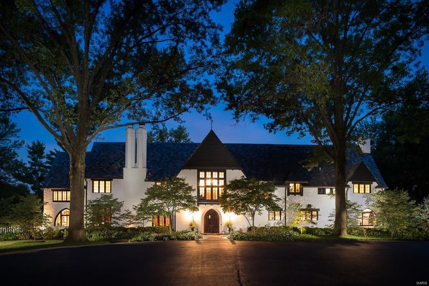 Back on market, buyer unable to close. Reduced another $100,000. Seller wants it sold. Priced to be the single best value of any St Louis Estate. A Maritz & Young Manse,with highest curb appeal you'll ever find. Stately, elegant, renovated with Modern appointments throughout to be fully functional: Newer Slate Roof, Lutron one-touch lighting, Master Suite and Bath gutted to studs in 2012 with new Spa bath, windows, heated bath floors, Cerrera marble and Shower with bench seat. The Gourmet Kitchen features Wolf, SubZero, granite, island and Breakfast Room. Massive addition on Main offsets no LL. A large, level yard and side play area is ideal for addition of future pool. 4 Suites, 7 updated BA. Design details are in perfect symmetry: French doors, solid wood doors, ironwork, millwork, Classic and virtually indestructible terrazzo floors. Guest Cottage is perfect as Office or Studio.  Ideal for fundraisers, celebrations, strategic events.