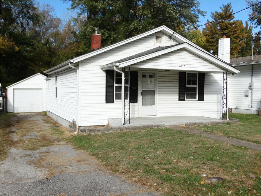 Back on the market, no fault of the house! NO inspections were done. Buyer's financing fell through.  Lot's of potential in this 2 bedroom 1 bath home on a large level lot in town. Home has an over sized detached garage with lots of room. Fenced back yard. New siding and windows in the last 12 years. Roof and furnace are about 8 years old. It just needs you to provide a little TLC with some flooring and paint.