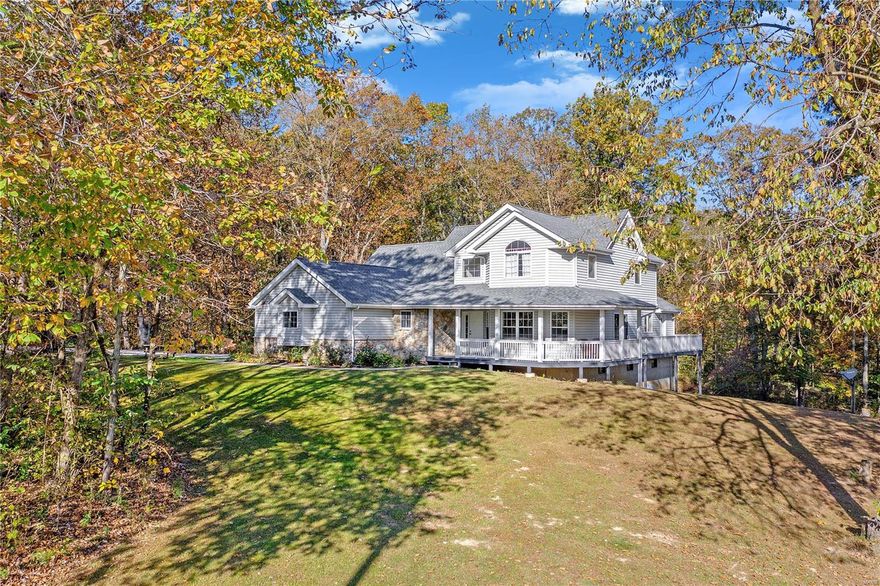 4 Bed/3.5 Bath 2600+ square ft home sits on 76.56+- acres in the heart of Lincoln County.  This well-designed home is perfect for making memories, whether you are gathered around the wood-burning fireplace or enjoying the outdoors on the screened-in porch or at the lake.  So many great features including a wrap-around front porch, vaulted ceilings, great room w/ fireplace, spacious eat-in kitchen, separate dining room, and den.  Plus, the main floor master bedroom suite and laundry make this a forever home!  Upstairs has 3 nice bedrooms and 2 full baths (1 en suite).  Full walkout basement w/ bathroom rough-in.  Beautiful grounds include 64 x 50 outbuilding, open fields (approx. 15 acres), woods, year-round stone bottom creek, 2.5 acre stocked lake, pond, numerous 4-wheel trails, established foot plots, abundant wildlife, and great hunting!  Outbuilding has electric, water, 10x40 lean-to w/ dog pens, 14’ ceiling, walk-in cooler & 12w x 10.5h slider door.