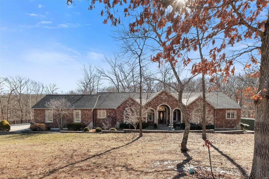 PICS POSTING 3/4 VIDEO TOUR UPLOADED - Over 5500 sq ft of living area, 28'x22' Kitchen w/ miles of granite, 42" Cherrywood cabinets, 2 separate bars in kitchen area, Separate dining room w/ tray stamped ceiling & recessed lighting. 39'x24' Great Room host ceiling high stone & brick Napoleon w/b fp, 8' Solid wood doors throughout, New lighting in many areas, Brazilian Cherry wood flooring in great room & bed rooms. MB w/tray ceiling, bay sitting area, 22'x6' closet & 22'x8' M bath separate shower w/ oversized jacuzzi tub, marble floor. 40'x27' Finished LL family room area, bar area. 2 bed in LL (1 of which is non conforming), Full bath in LL. Pool table room w/separate entrance could be a office. Safe room w/safe door, Alarm system throughout. 2 tankless w/h, 2 zoned HVAC systems, Composite deck, Generac Generator. 28'x30' Insulated building w/ concrete floor, overhead door & 2 man doors, forced air heat, & water.  Side by side trails in woods. Fire pit, Hot tub stays. Suitable for Bed/Brk