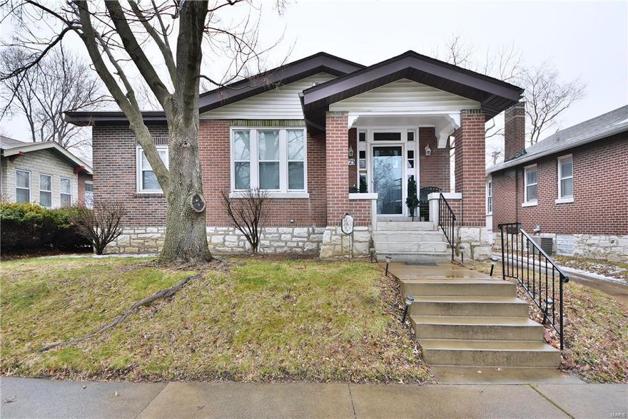 NEW PRICE! SPACIOUS & UPDATED! This stunning 2 bedroom, 2 full bath home boast over 1,600 square feet & features an airy & sought after open floor plan in city living. The inviting covered porch welcomes you & is perfect for your morning coffee. Hardwood floors throughout the home and the large foyer opens into the beautiful living room with fireplace focal point. Painted with neutral colors and 10' ceilings this home is perfect for the move-in ready buyer. The SPACIOUS master suite will leave you amazed with walkin closet and attached updated bathroom. Featuring a divided bedroom floor plan the second bedroom is located conveniently near the 2nd full bath that offers fresh tile, linen closet, newer vanity & is HUGE! Closet space is not something forgotten about in this city house! The LARGE kitchen has 42" cabinets, large center island with breakfast bar, stainless steel appliances and updated backsplash. Bonus room with endless possibilities, oversized 1 car garage, private driveway!