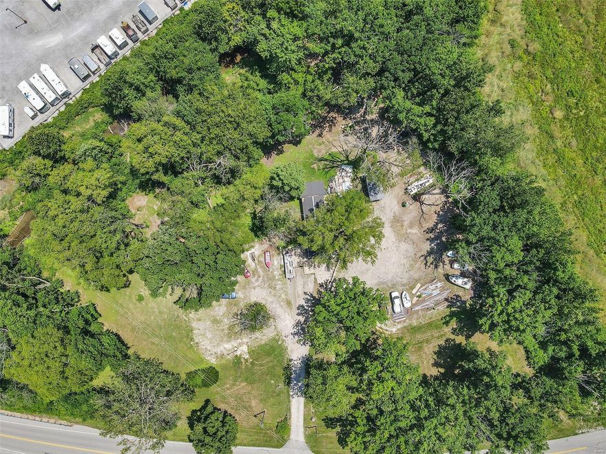 Bring your vision to light!  Don't miss your opportunity to own this picture perfect 2.91 Acre Tract in the City of Saint Paul. Enjoy the peace and quiet of the country but 4 miles to HWY 70!  Mostly Cleared, some land built up, surrounded by thick tree line with levee-ed creek running through the backside of the property. So many options & great potential for your Dream Home, Dream Pole Barn/Man Cave/Shop, Small Farm, Storage, Recreational Use, Bring your 4 Wheelers/Side by Sides.  This property is in a flood plain but easy to finish raising the grade for a premium layout. Electric and Well are Present. Oversized Garage/Carport present.  Call List Agent with any questions.