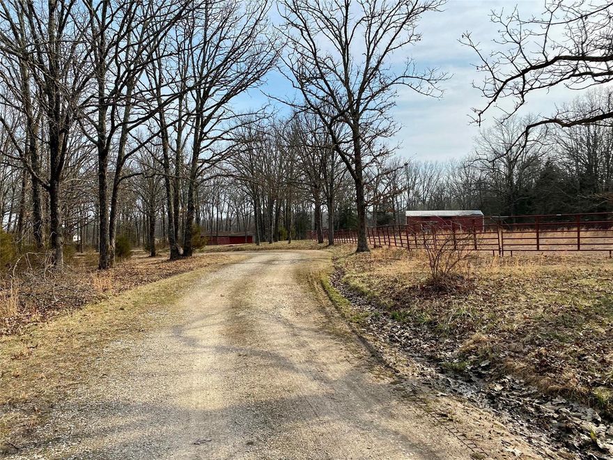 Desirable 14.79 Acre Farm Property for Sale!  Beautiful 2 story country home located right off Hwy 72 and off a private road.  It is privacy right next to the city! This adorable home has 3 bedrooms and 3 bathrooms with a huge laundry room and amazing wood burning fireplace. Three huge bedrooms and a must see custom built pantry.  This property has an amazing 2 stall horse barn with a paddock and there is also a uncovered round pen.  Also a nice pond and small fenced in area behind the home for your 4 legged friends. The entire property has electric fencing.  This is your opportunity to own some great farm and horse property.  Come and  discover this as your next home! Additional Rooms: Mud Room