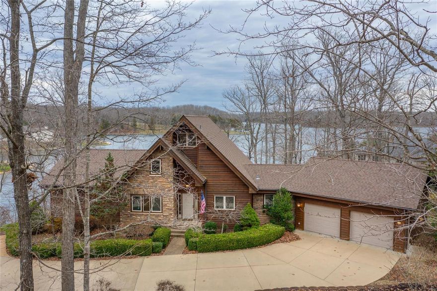 Stunning Lodge located privately situated on 2 acres with breathtaking expansive views of 237 Acre Alpine Lake. This spectacular Lindal Western Redwood Cedar Home has that true Innsbrook feel and is perfect for your dream second home or year round resort living. This 4 + bedroom 3 and a half bath home boasts an open floor plan with dramatic wood ceilings and windows, gorgeous wood floors, beautiful custom kitchen with granite countertops opening to the great room with stunning stone fireplace. Spacious main  floor master bedroom plus luxury bath plus a separate den.  Upstairs is an adorable loft area with private bedroom and bath.  The lower level has a fabulous wet bar, another cozy fireplace and large family room plus two more bedrooms and another full baths.  Plenty of room for friends and family outside too with the expansive deck, 2 acre lot and private lakeside dock and over 300 feet of shoreline! Open House Sat 12-2 will view contracts Sunday afternoon Additional Rooms: Mud Room